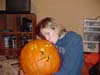 Jenn kisses the pumpkin