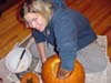 Jenn carving a pumpkin